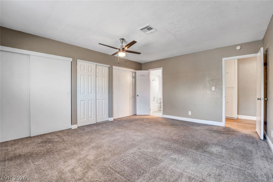 4367 South Mojave Road Las Vegas, NV 89121 - Photo 38 of 53 A restful chamber showcasing ample closet space and plush carpeting, ready for personalization.