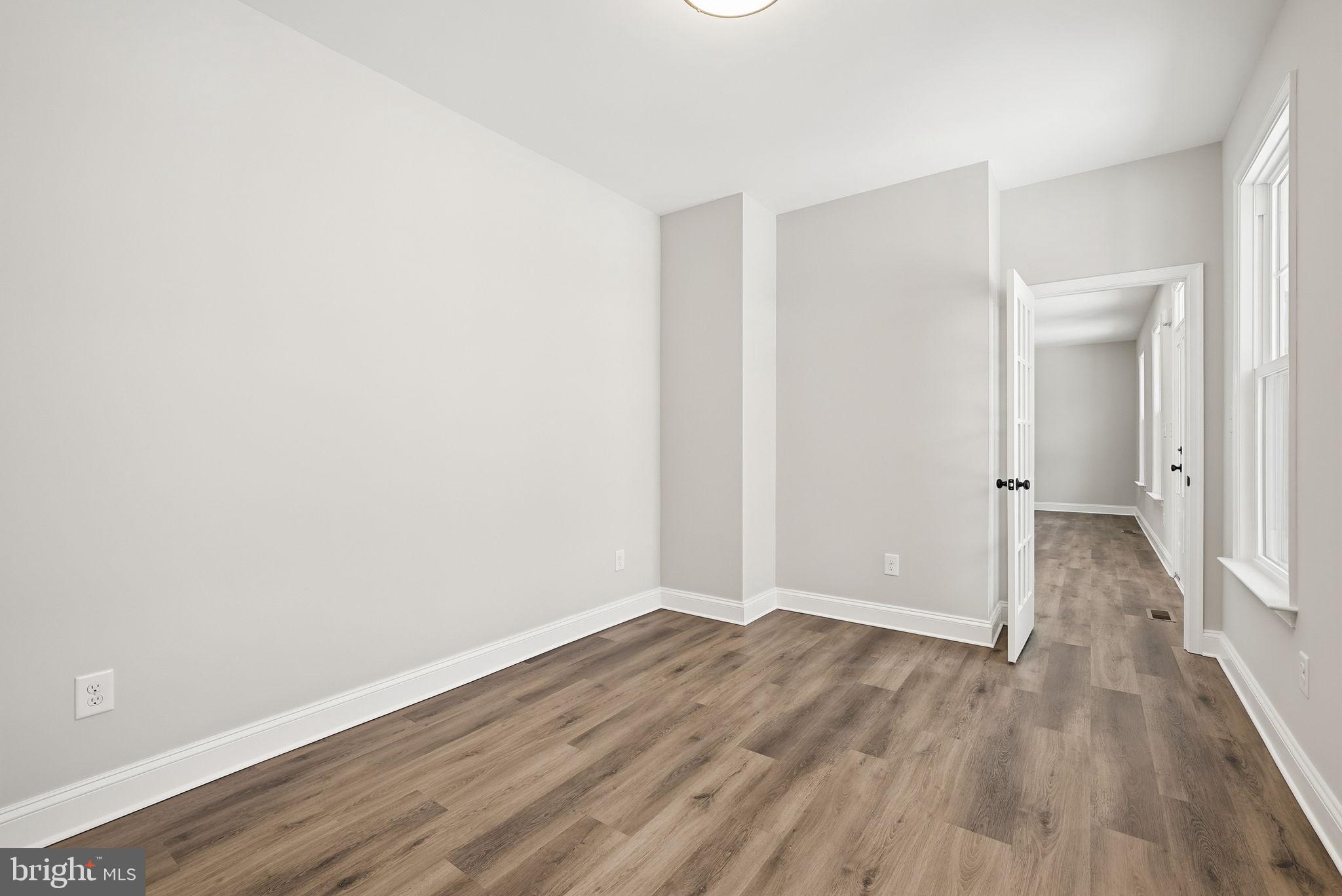 9586 South Pines Road Warrenton, VA 20186 - Photo 12 of 53 a view of an empty room with wooden floor