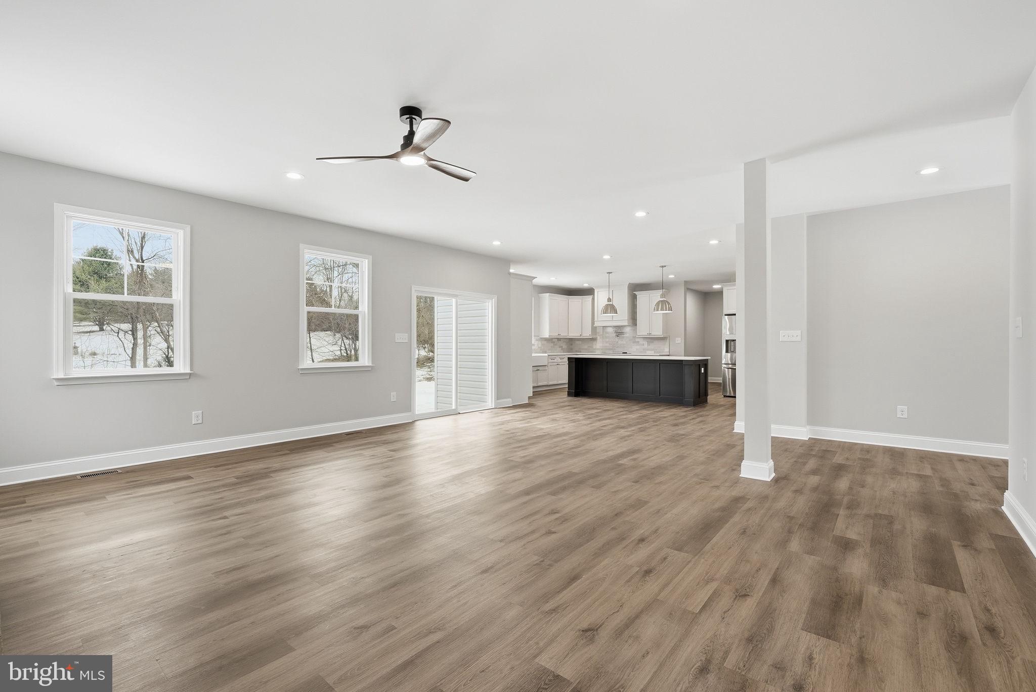 9586 South Pines Road Warrenton, VA 20186 - Photo 17 of 53 a view of empty room with wooden floor and window