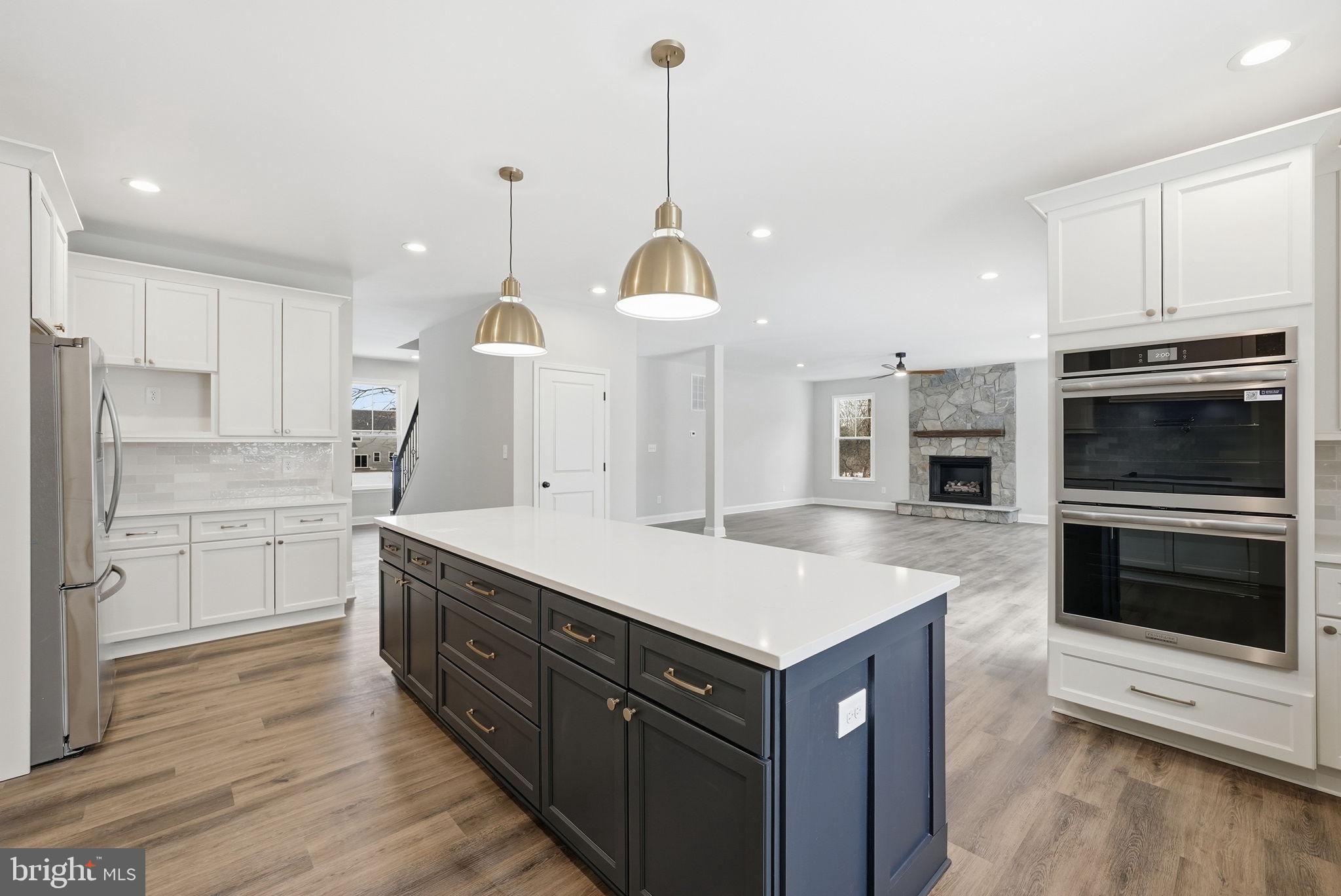 9586 South Pines Road Warrenton, VA 20186 - Photo 20 of 53 a kitchen with a sink appliances and cabinets