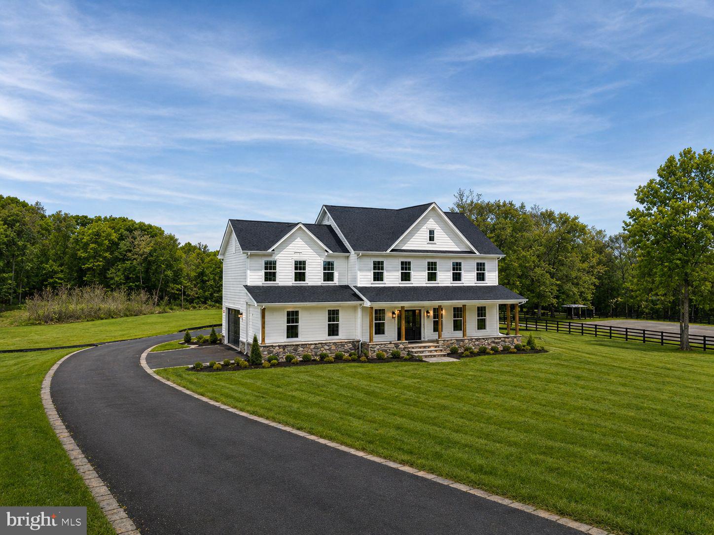9586 South Pines Road Warrenton, VA 20186 - Photo 2 of 53 a view of a house with a big yard