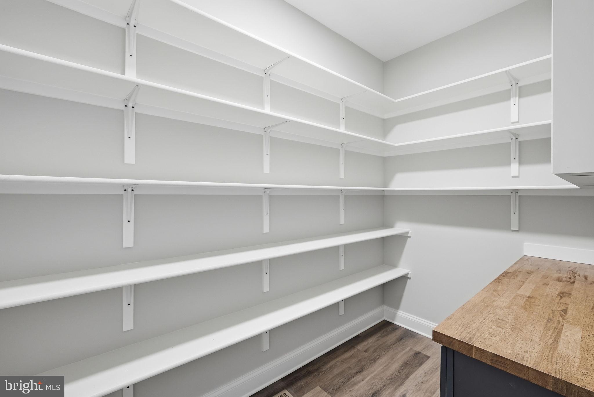 9586 South Pines Road Warrenton, VA 20186 - Photo 26 of 53 a view of room with cabinets and wooden floor
