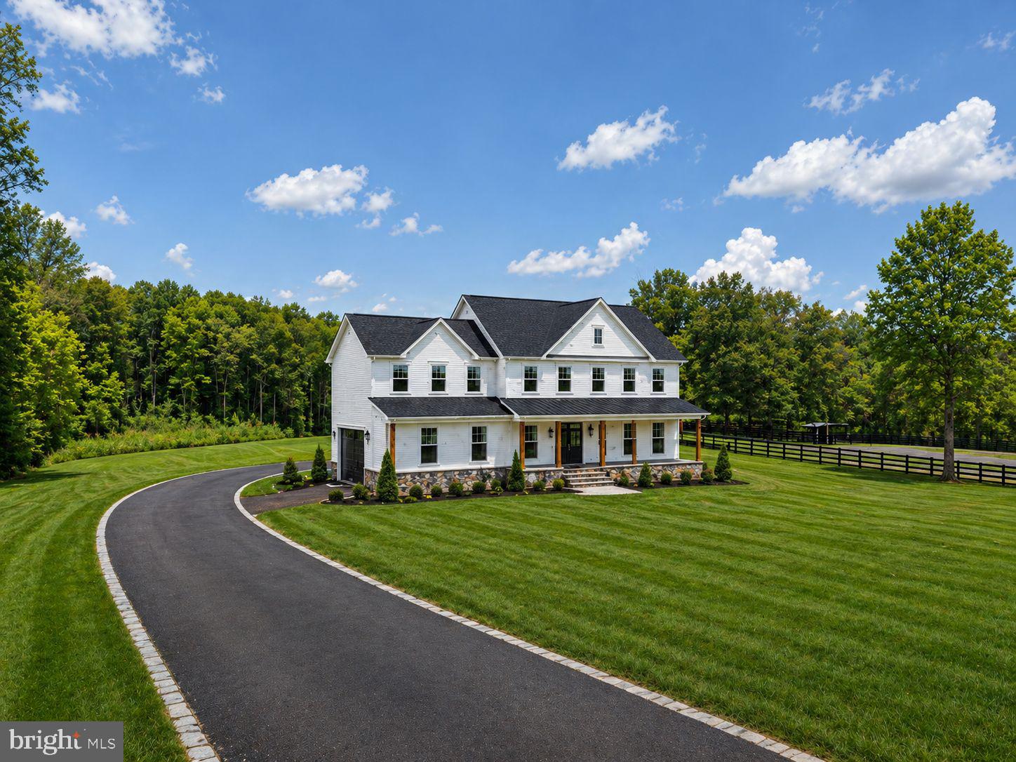 9586 South Pines Road Warrenton, VA 20186 - Photo 3 of 53 a view of a house with a big yard