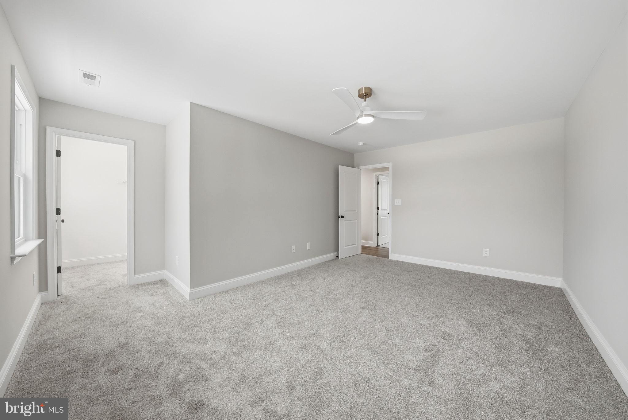 9586 South Pines Road Warrenton, VA 20186 - Photo 34 of 53 an empty room with a bathroom