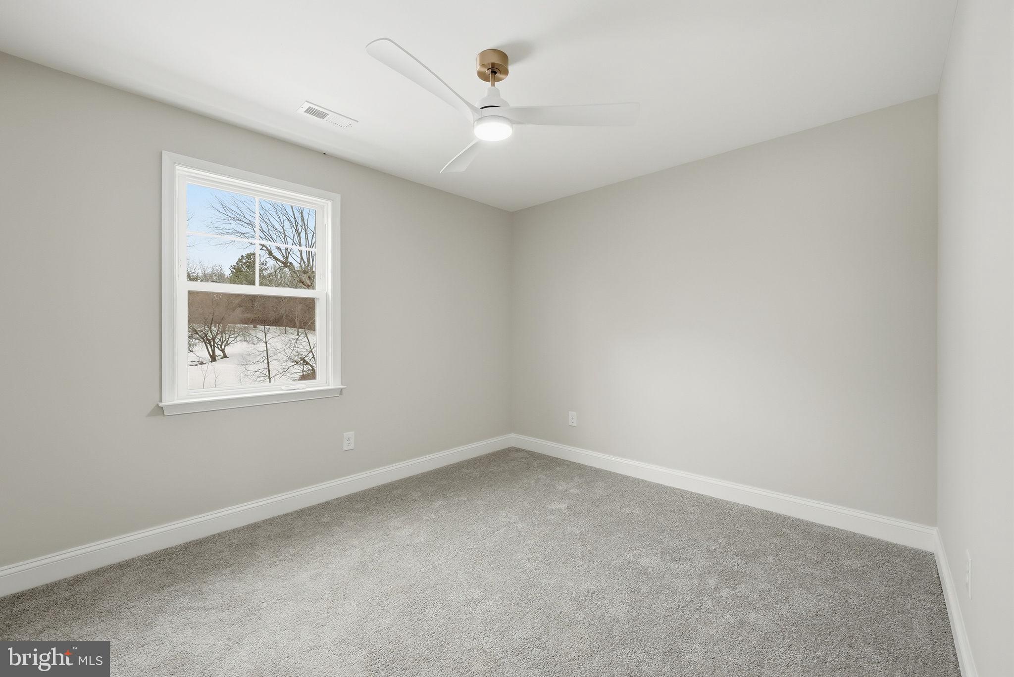 9586 South Pines Road Warrenton, VA 20186 - Photo 39 of 53 an empty room with a window