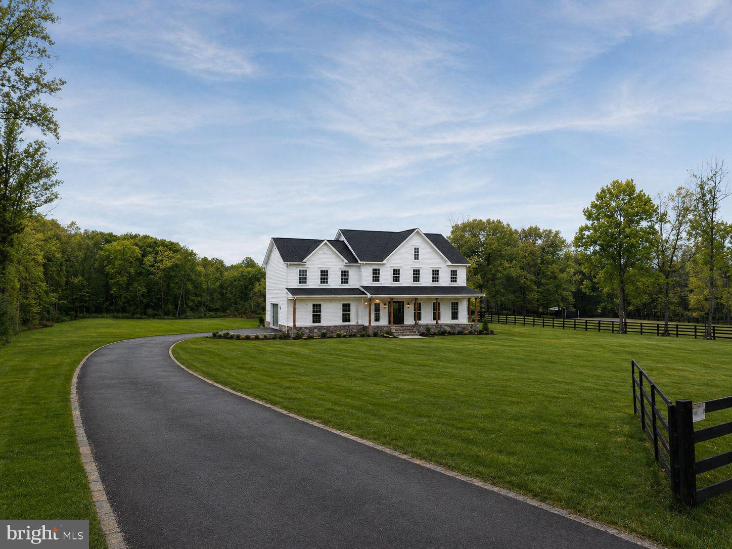 9586 South Pines Road Warrenton, VA 20186 - Photo 4 of 53 a view of a golf course with a garden