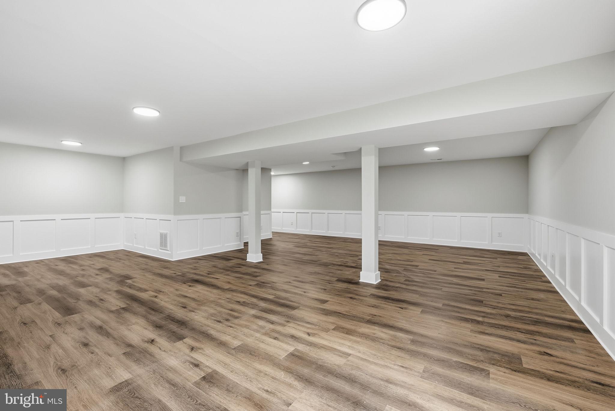 9586 South Pines Road Warrenton, VA 20186 - Photo 47 of 53 a view of empty room with wooden floor