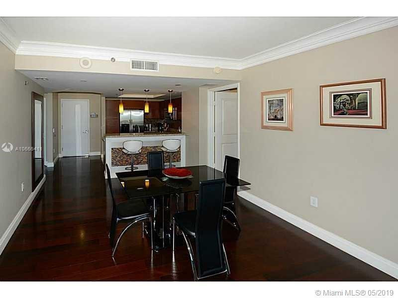 2641 North Flamingo Road, Unit 2103N Sunrise, FL 33323 - Photo 3 of 5 a view of a workspace with furniture