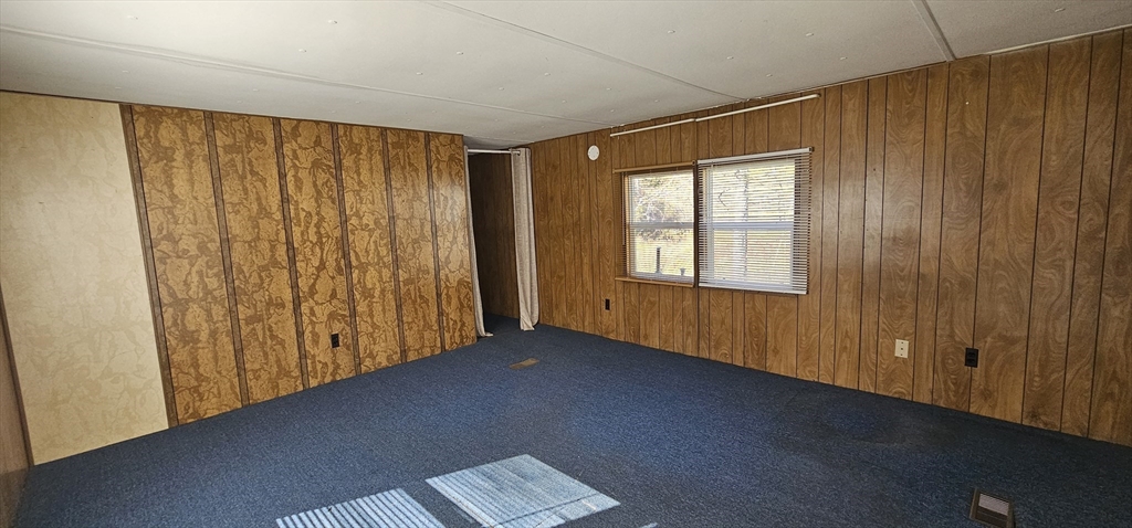 46 Madden Road, Unit 39 West Brookfield, MA 01585 - Photo 7 of 15 a view of an empty room with a window