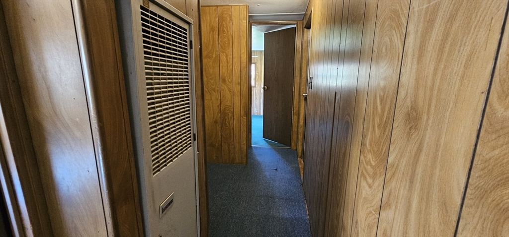 46 Madden Road, Unit 39 West Brookfield, MA 01585 - Photo 9 of 15 a view of a bathroom from a hallway
