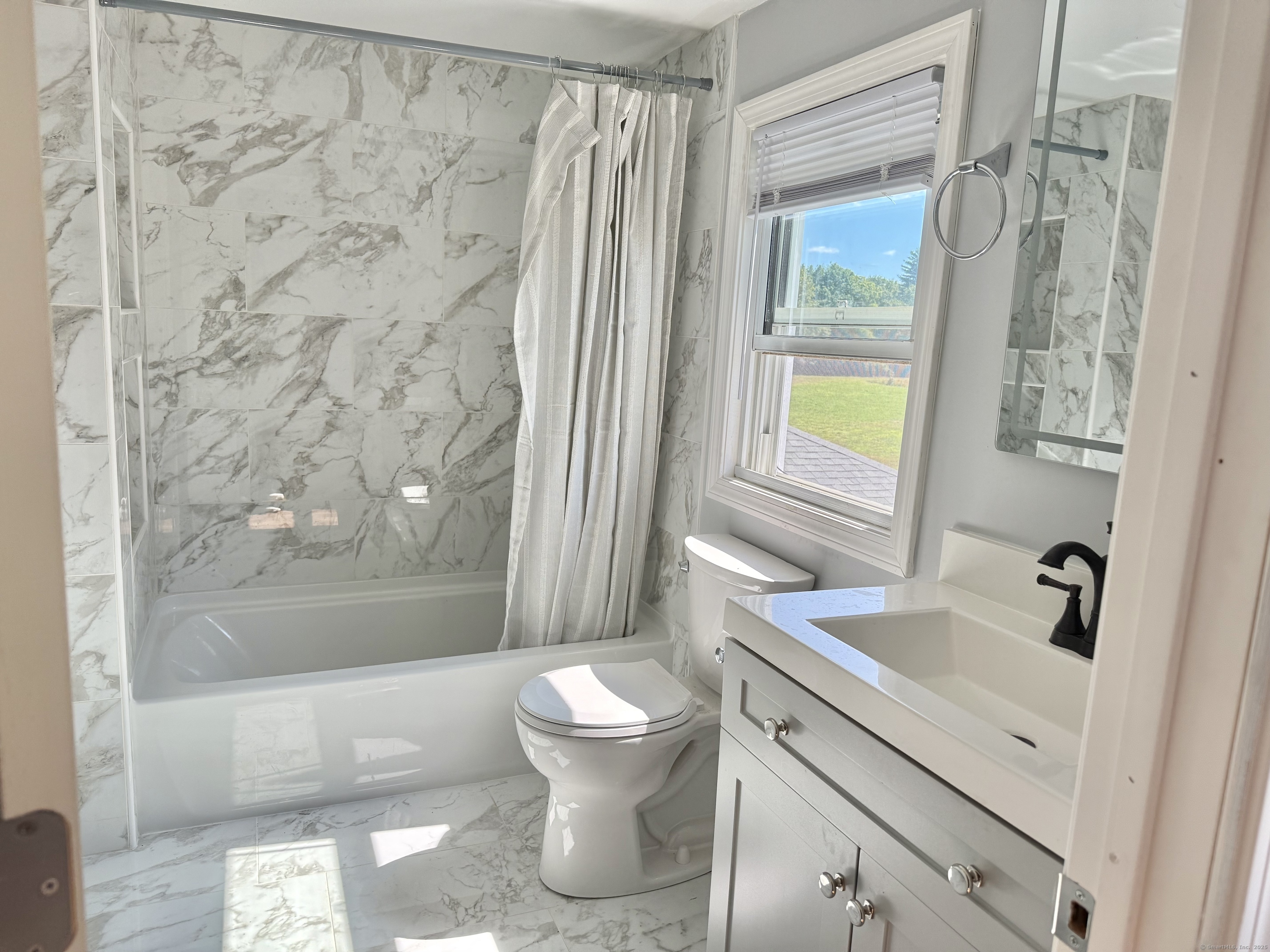 151 Bitgood Road Griswold, CT 06351 - Photo 16 of 20 a bathroom with a sink toilet and shower