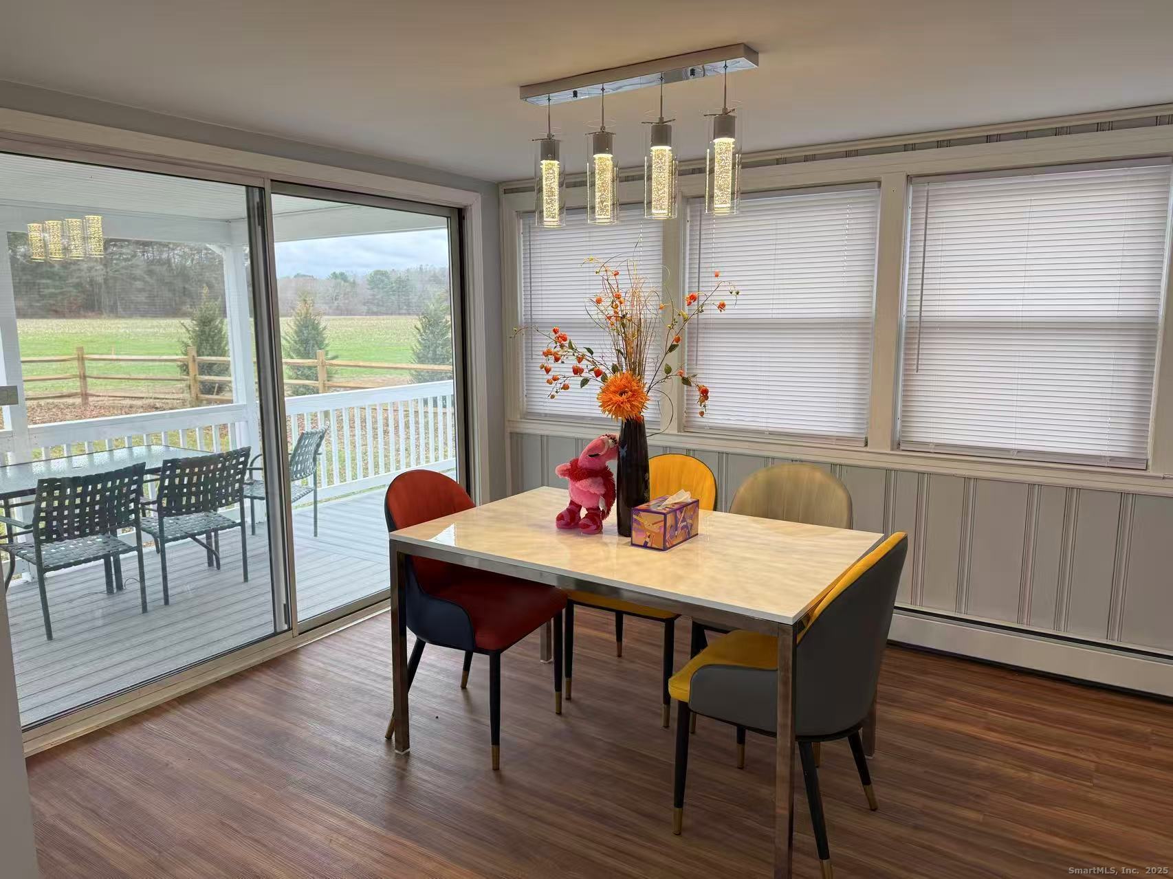 151 Bitgood Road Griswold, CT 06351 - Photo 9 of 20 a view of a dining room with furniture and wooden floor