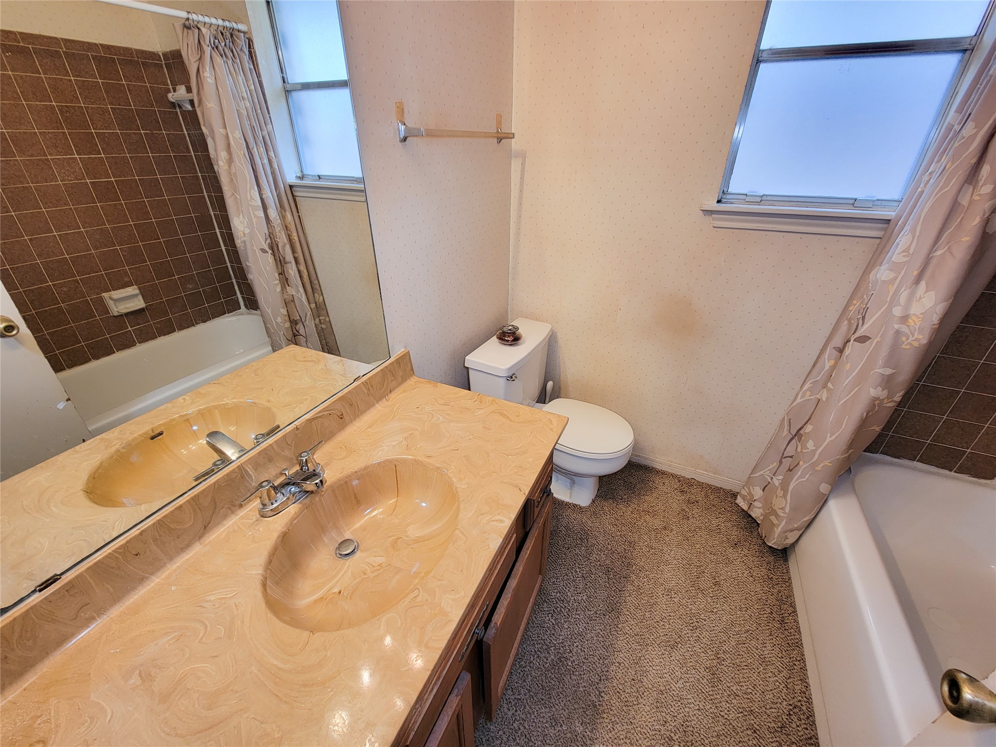 23211 Timberbrook Drive Spring, TX 77373 - Photo 23 of 34 a bathroom with a tub and sink
