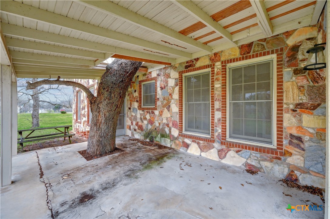 222 Myrtle Avenue Luling, TX 78648 - Photo 24 of 44 a front view of a house with a tree