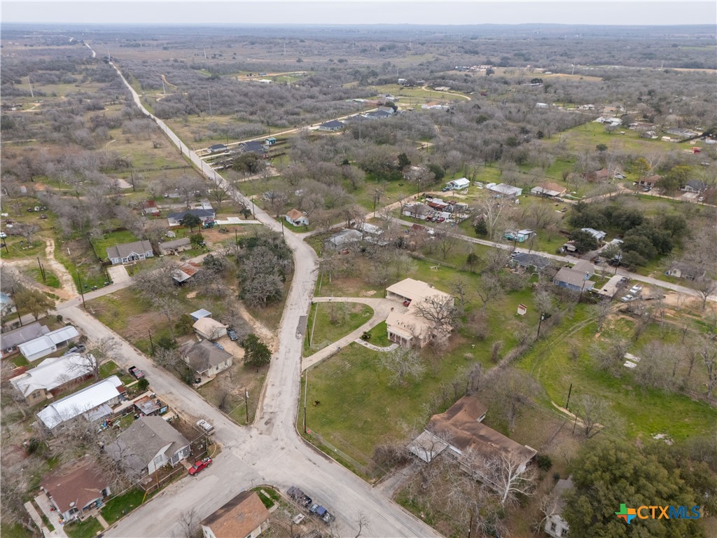 222 Myrtle Avenue Luling, TX 78648 - Photo 40 of 44 an aerial view of residential houses with outdoor space