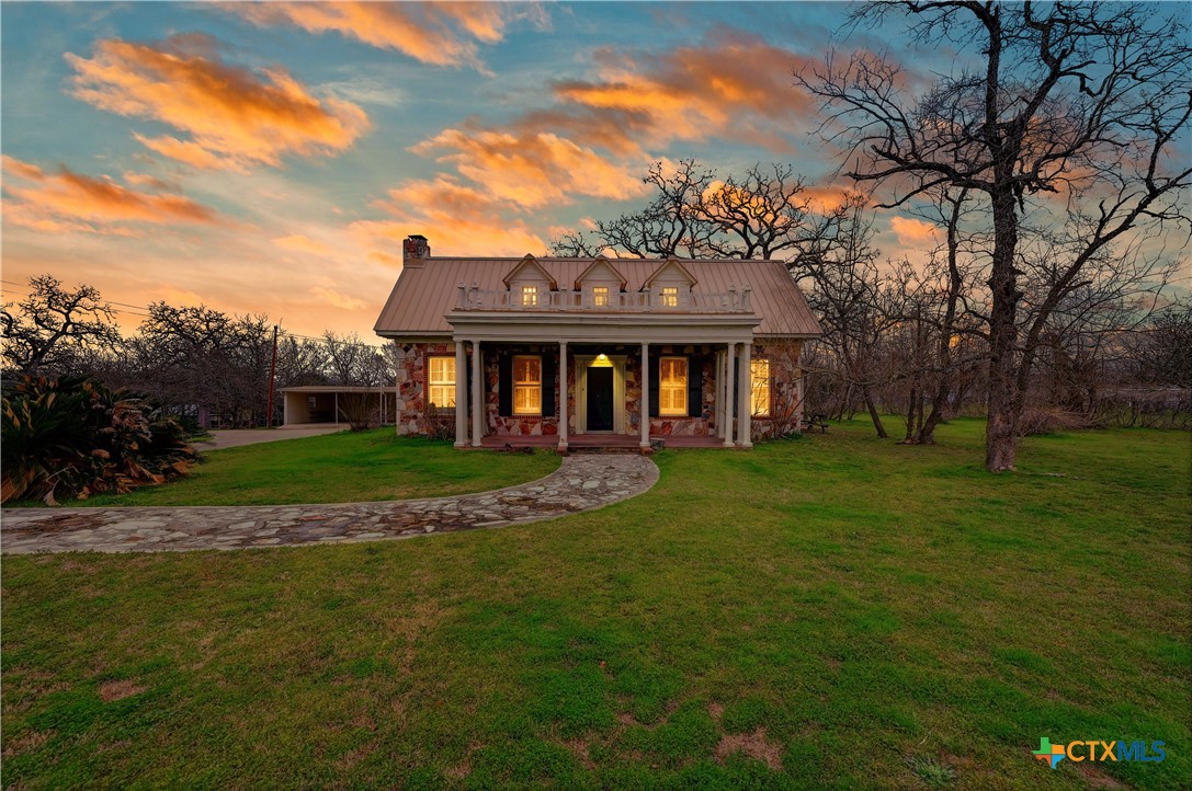 222 Myrtle Avenue Luling, TX 78648 - Photo 43 of 44 a front view of a house with a yard