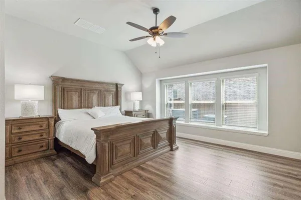 a bathroom with a double vanity sink mirror and