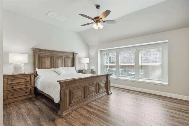 a bathroom with a double vanity sink mirror and