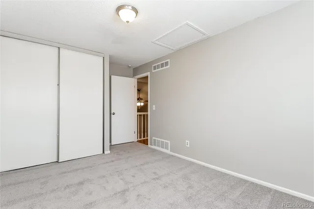 an empty room with closet