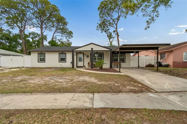 $565,000 | 7705 Jackson Springs Road, Tampa, FL 33615