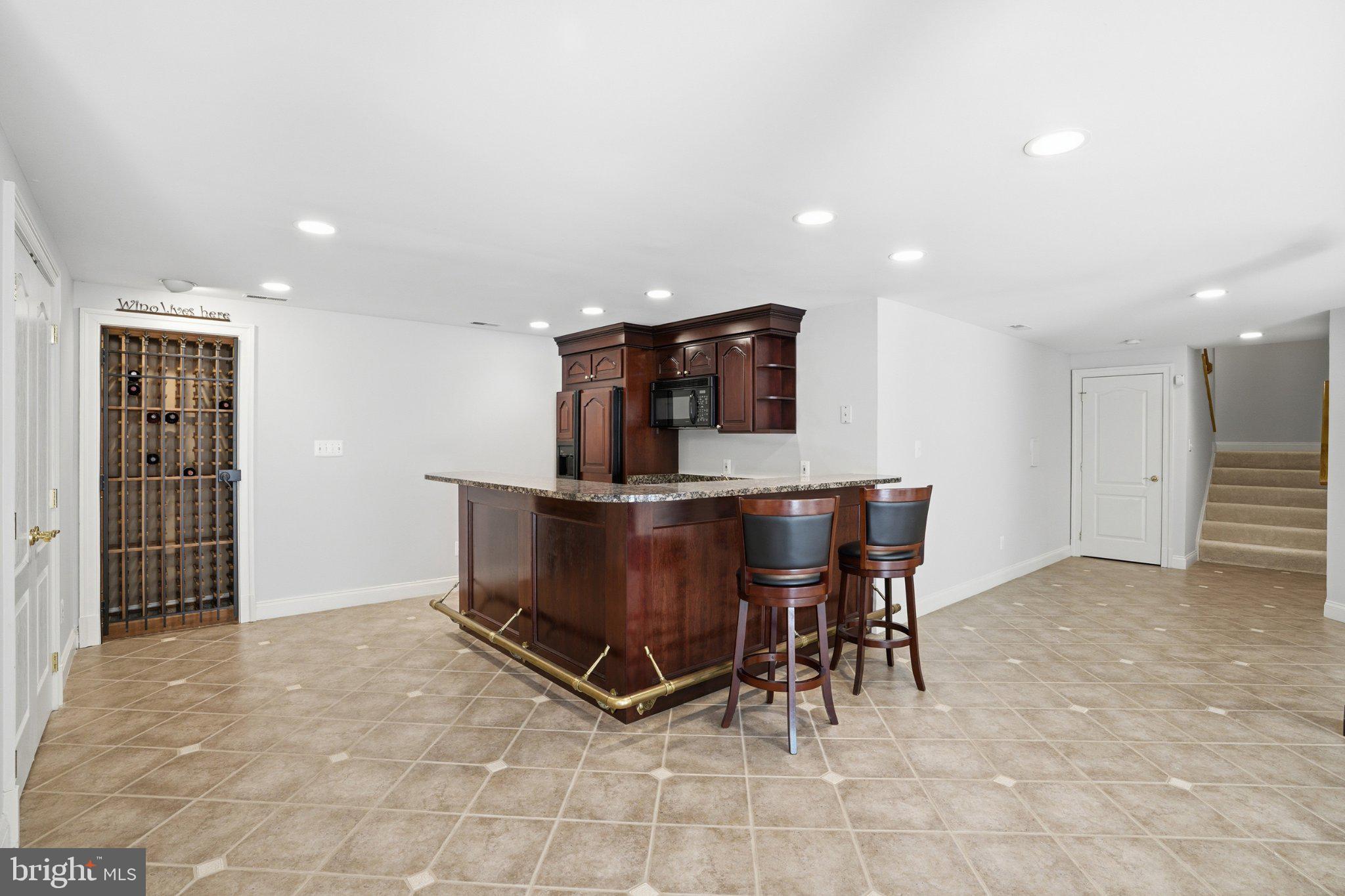 891 Chinquapin Road McLean, VA 22102 - Photo 63 of 78 Spacious basement with elegant bar area.