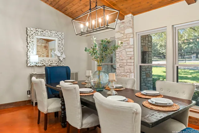 a kitchen with a stove a sink and a microwave