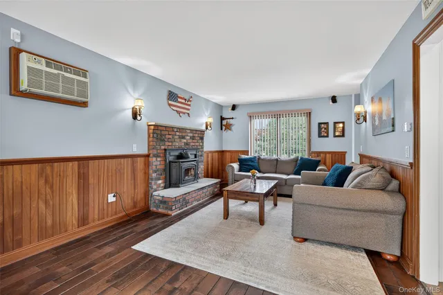 a bathroom with a sink toilet and a mirror