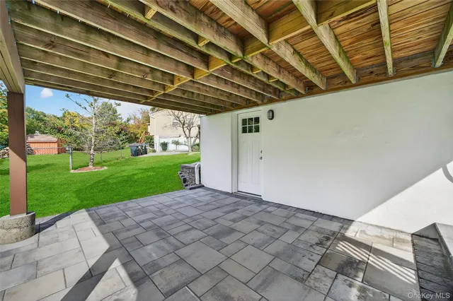 a view of a patio on the roof deck