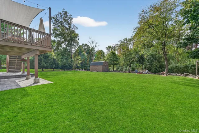 a view of a backyard of a house