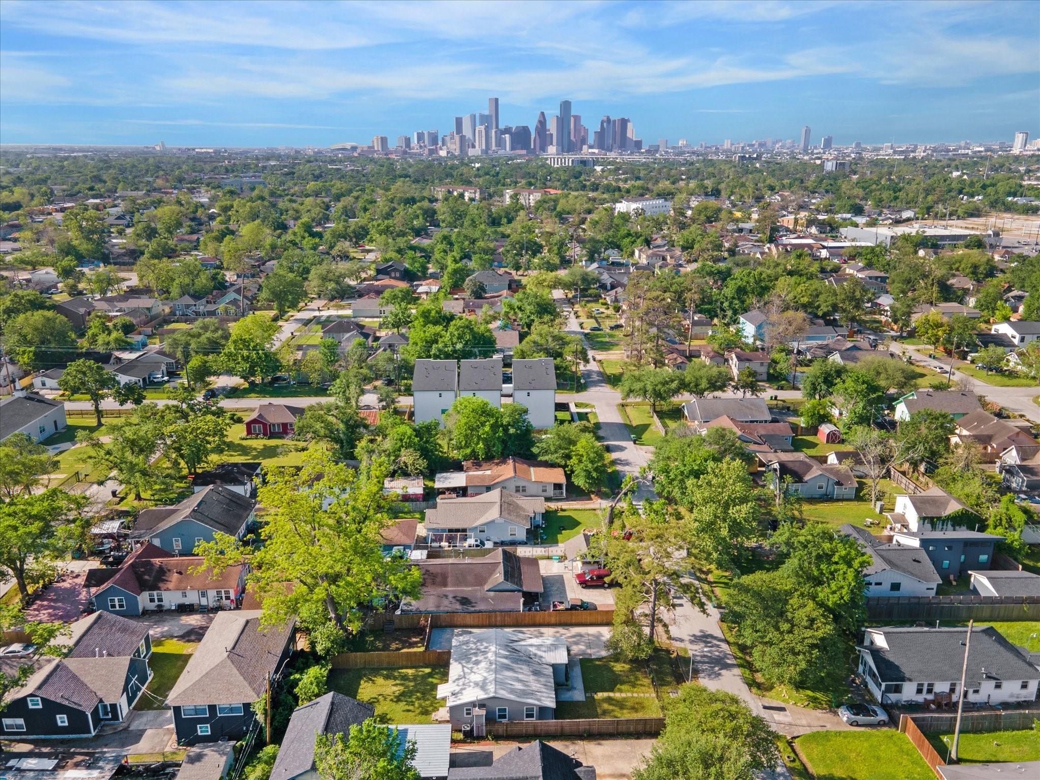 4502 Hain Street Houston, TX 77009 - Photo 14 of 16 an aerial view of a city with lots of residential buildings