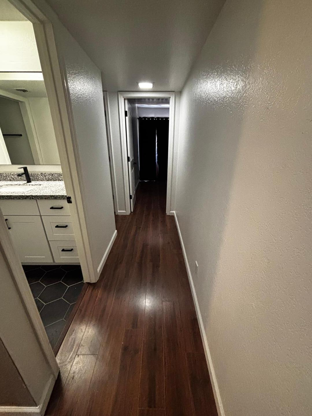 3030 North Hayden Road, Unit 16 Scottsdale, AZ 85251 - Photo 15 of 30 a view of hallway with wooden floor