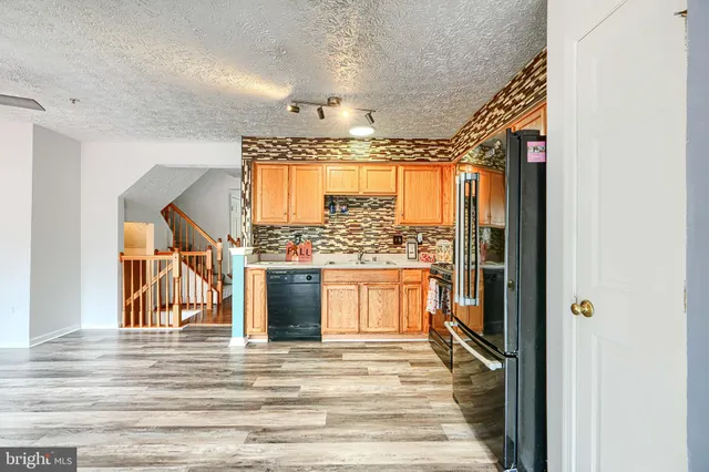 a view of a room with a large window