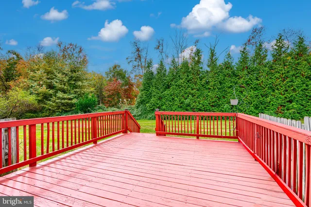 a balcony with wooden floor