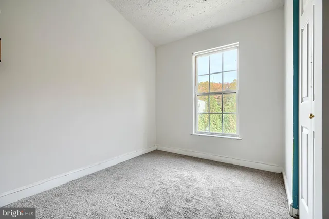 a view of a livingroom with entryway