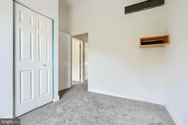 a view of a livingroom with a bench