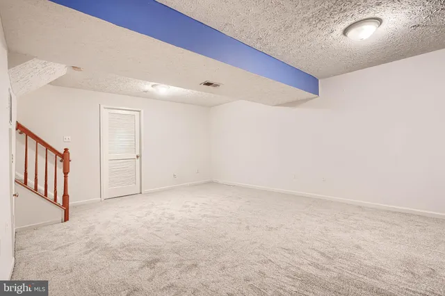 an empty room with a workbench