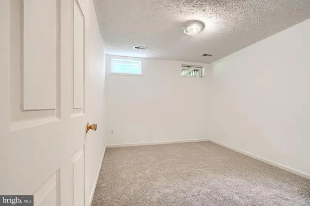an empty room with a workbench