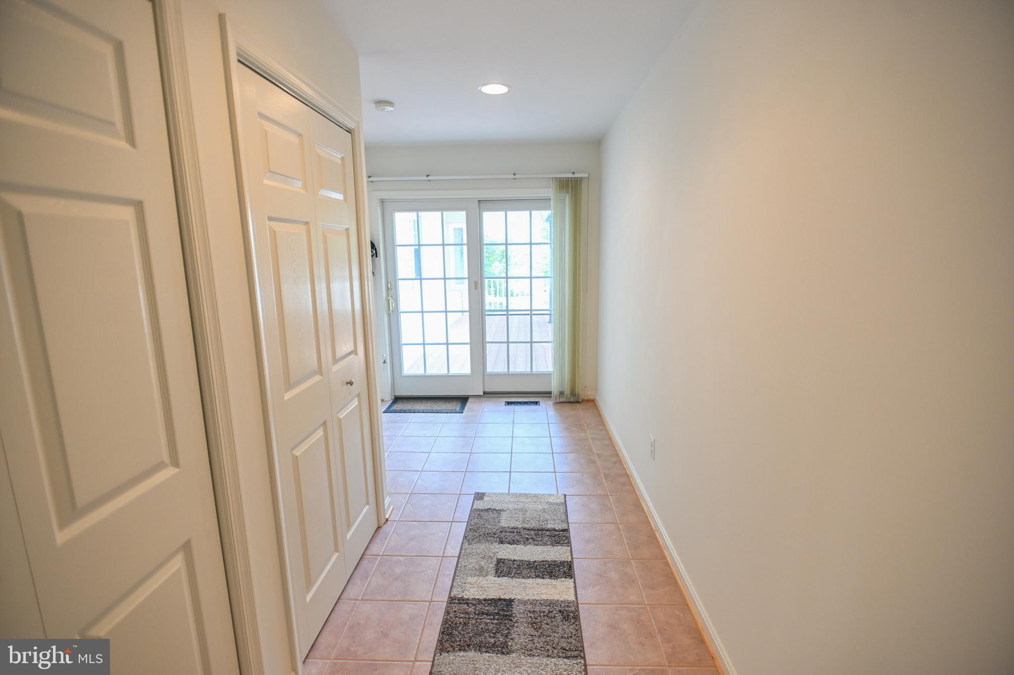 9229 Mellenbrook Road Columbia, MD 21045 - Photo 17 of 51 Backdoor and hallway to 1st floor primary suite