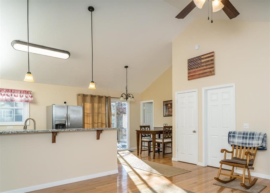 17480 Mt Pleasant Road Elkton, VA 22827 - Photo 9 of 14 a room with lots of wooden furniture and a chandelier
