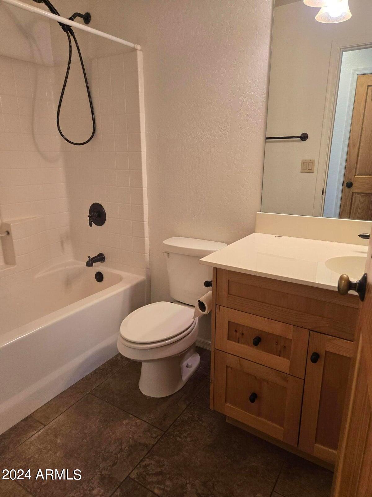 315 South Golden Bear Point Payson, AZ 85541 - Photo 19 of 29 a bathroom with a sink a toilet and shower