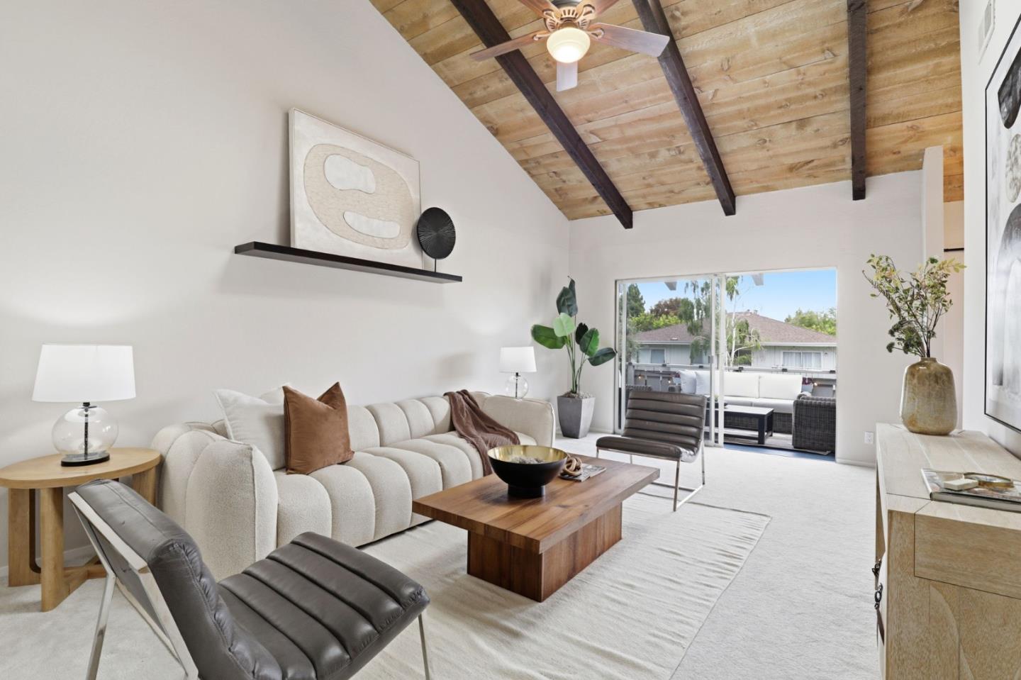 255 South Rengstorff Avenue, Unit 2 Mountain View, CA 94040 - Photo 2 of 25 a living room with furniture and wooden floor