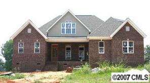 2729 Range Road Clover, SC 29710 - Photo 6 of 6 a view of a brick house with large windows