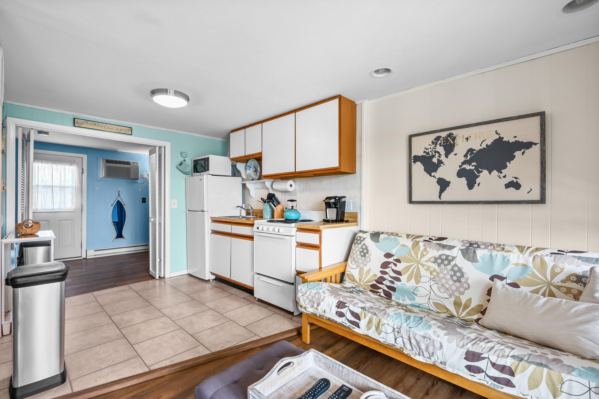 154 Old Wharf Road, Unit 36 Dennis Port, MA 02639 - Photo 13 of 28 a living room with furniture and kitchen view