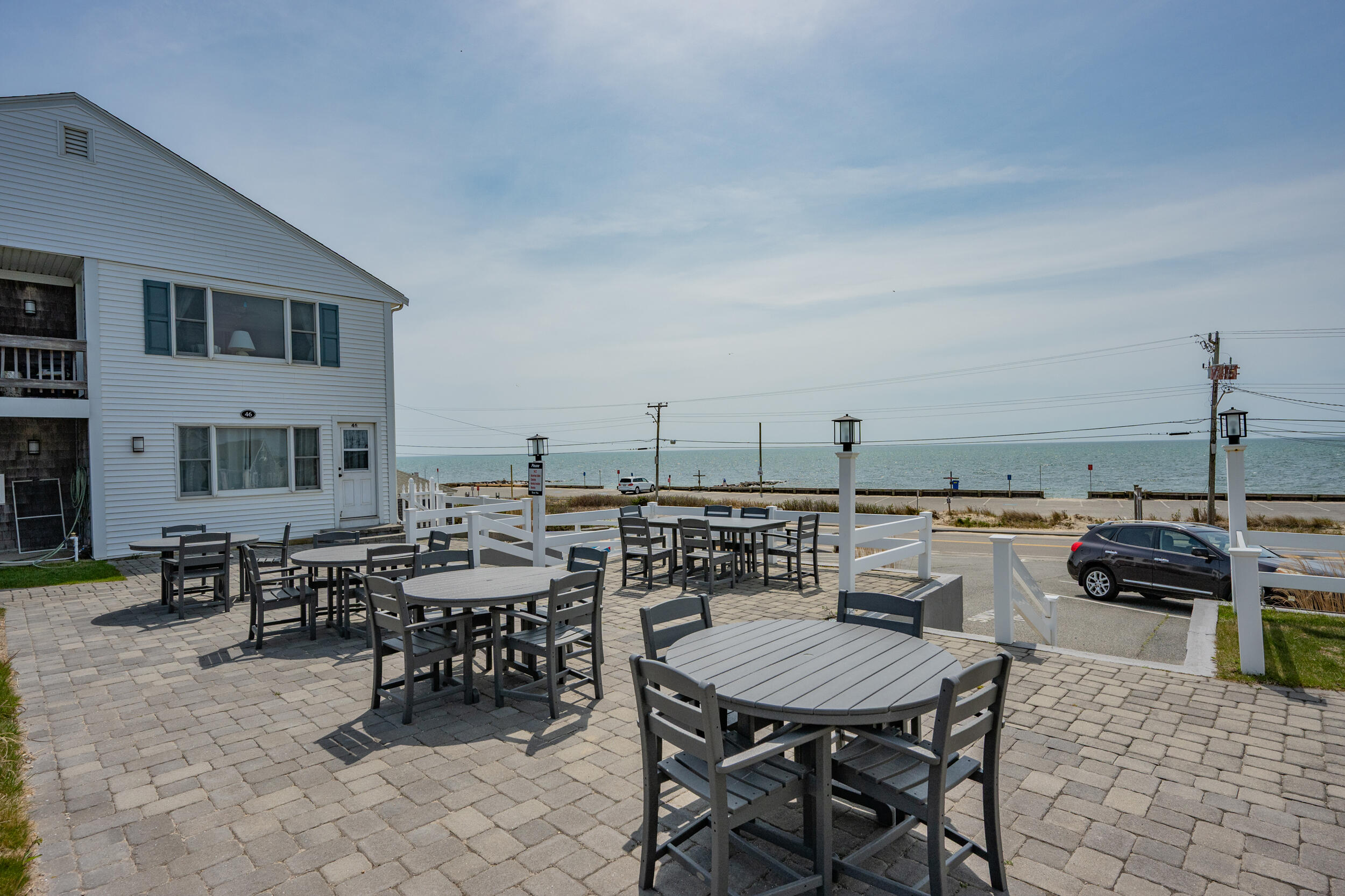 154 Old Wharf Road, Unit 36 Dennis Port, MA 02639 - Photo 23 of 28 a view of a terrace with furniture and stove