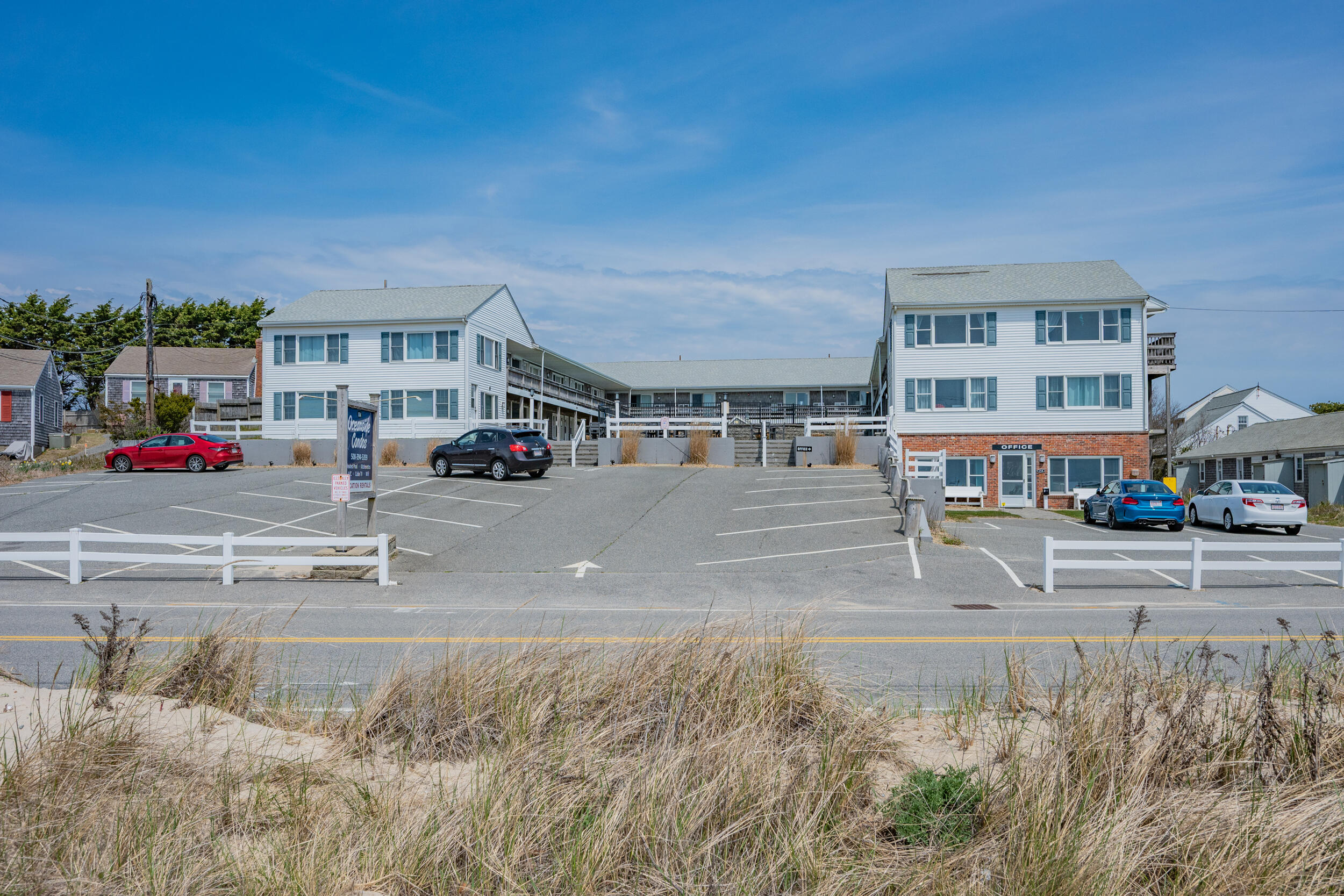 154 Old Wharf Road, Unit 36 Dennis Port, MA 02639 - Photo 25 of 28 a car parked on the side of the road