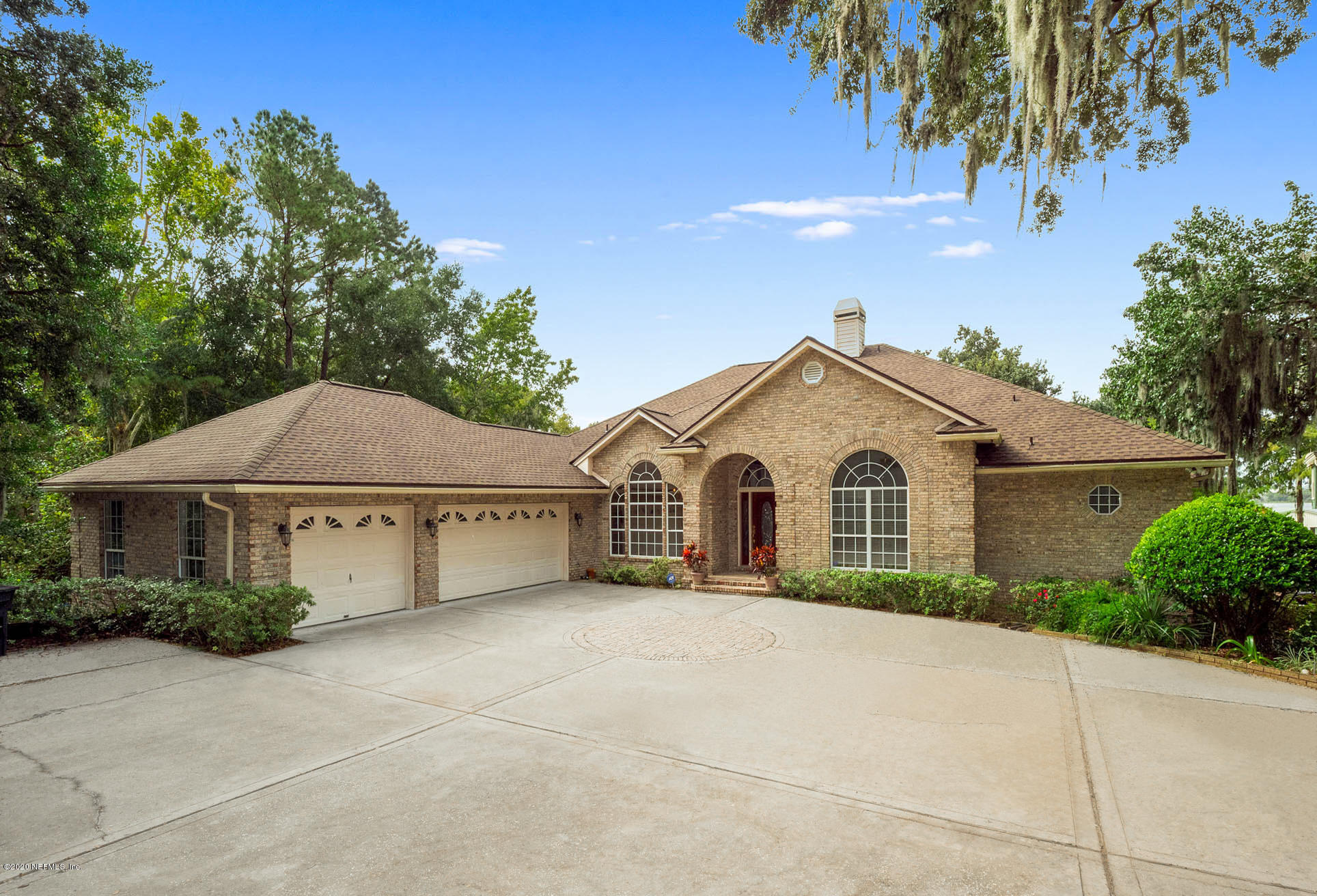 3664 Spinnaker Court Jacksonville, FL 32277 - Photo 1 of 42 a view of a house with a yard and large tree