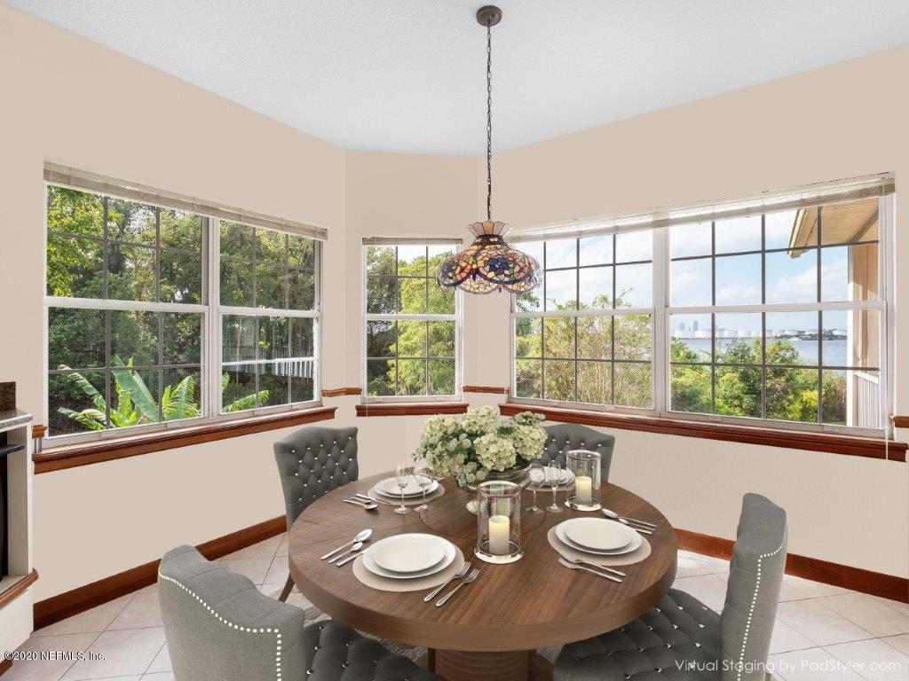3664 Spinnaker Court Jacksonville, FL 32277 - Photo 11 of 42 a view of a dining room with furniture window and outside view