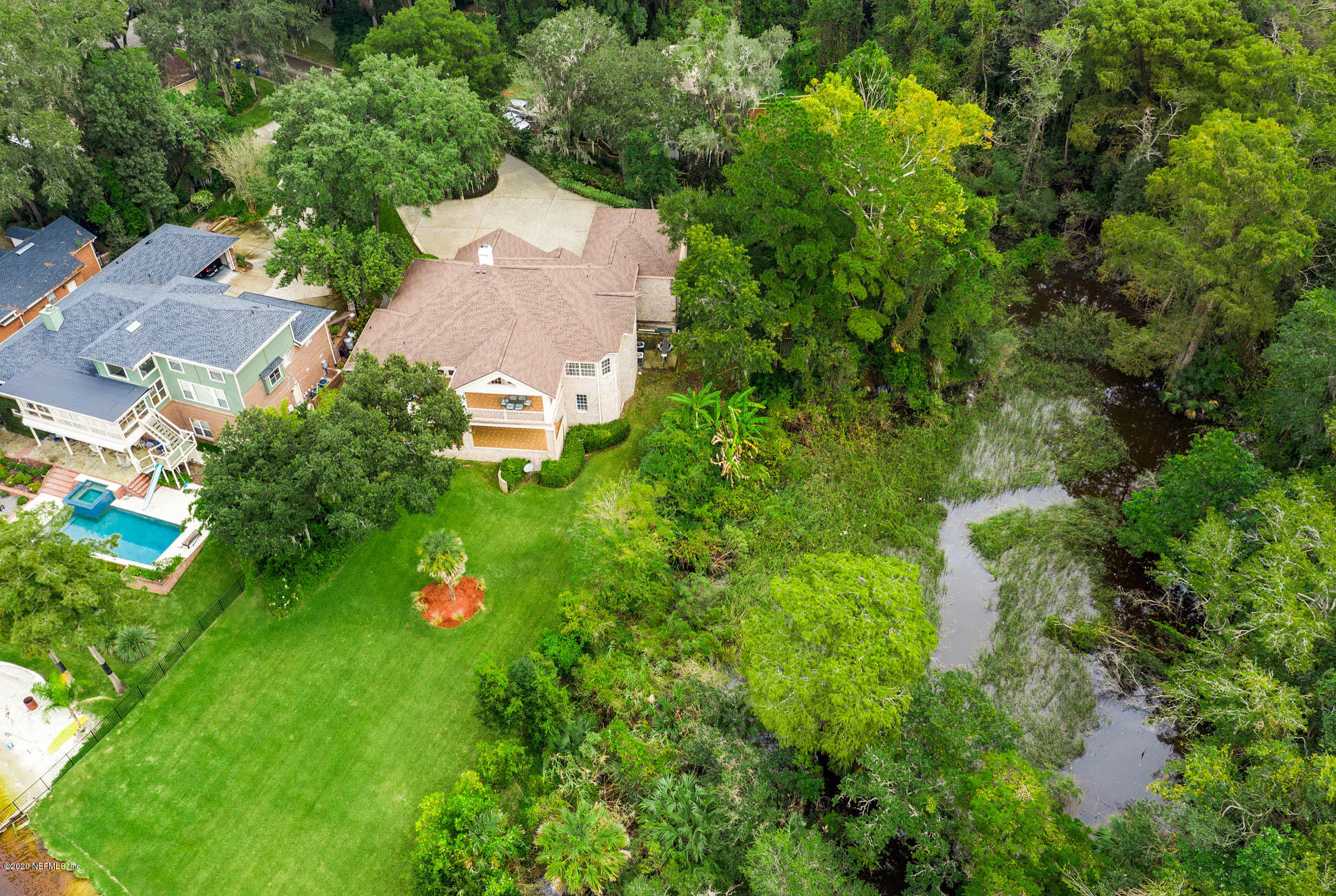 3664 Spinnaker Court Jacksonville, FL 32277 - Photo 41 of 42 an aerial view of residential house with an outdoor space and seating