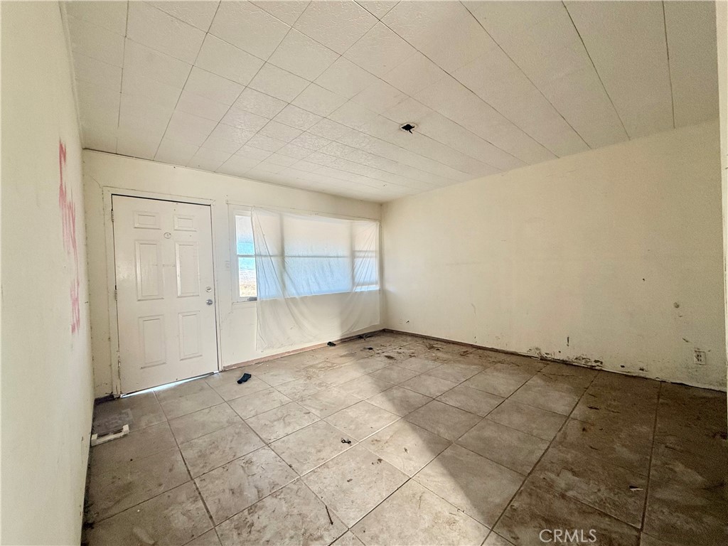 12331 Beech Street Trona, CA 93562 - Photo 10 of 16 an empty room with windows