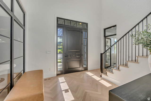 1720 Hillcrest Circle Mapleton, UT 84664 - Photo 32 of 116 Entryway featuring parquet flooring and a high ceiling